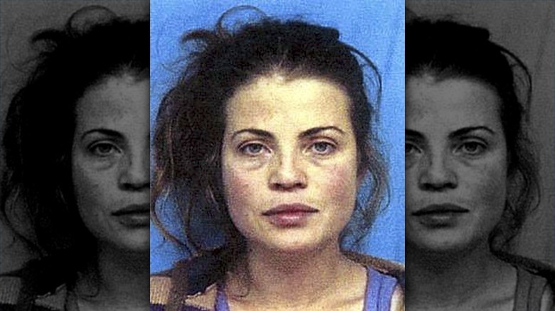 Young Yasmine Bleeth looking into camera