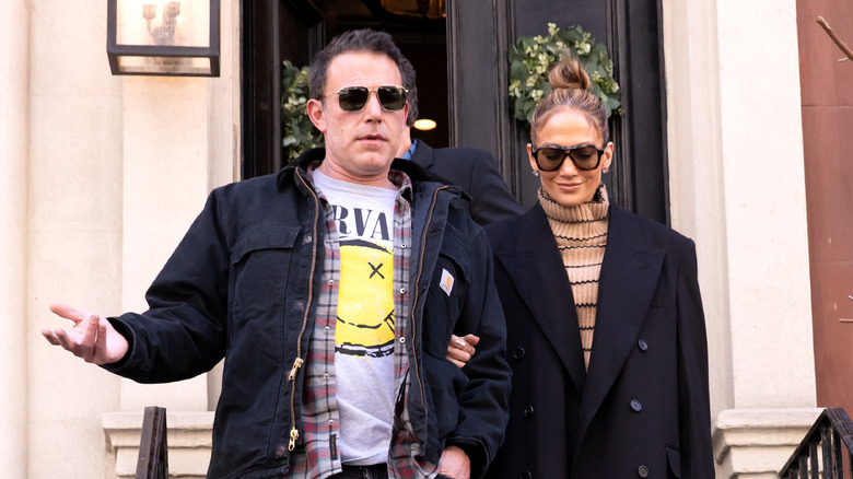 Ben Affleck and Jennifer Lopez in black jackets and sunglasses