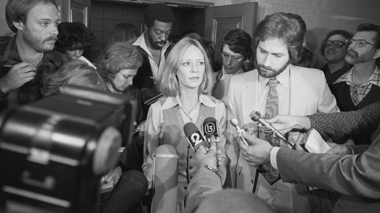 Marilyn Barnett speaking to reporters