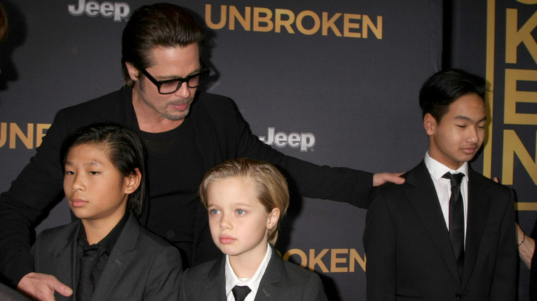 Shiloh Jolie with her father, Brad Pitt, and her siblings at the "Unbroken" L.A. premiere