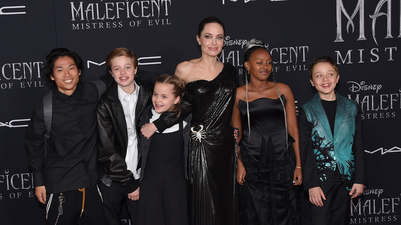 Shiloh Jolie with Angelina Jolie and her siblings at the world premiere of "Maleficent: Mistress of Evil"