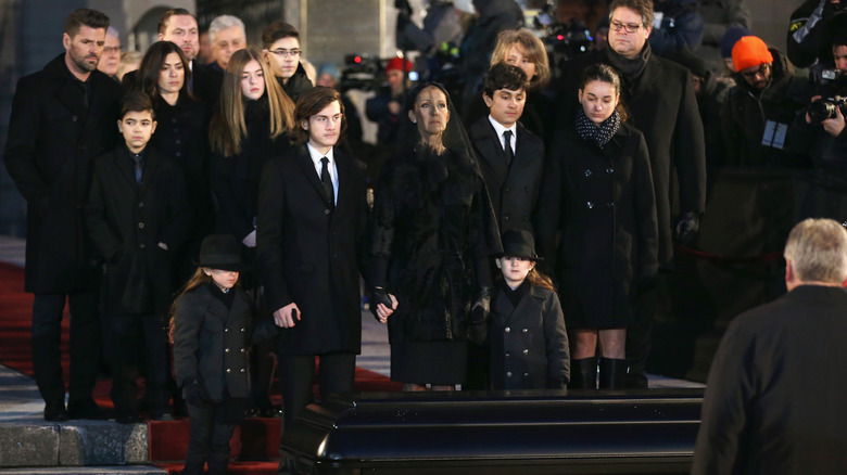 Céline Dion and her three sons attend René Angélil's funeral