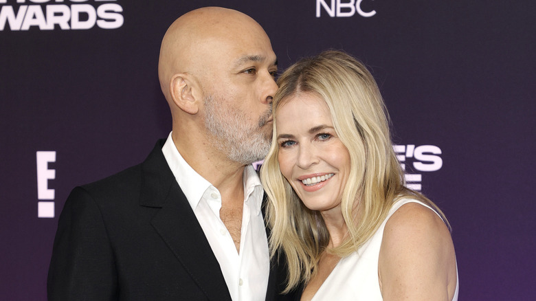 Jo Koy kissing Chelsea Handler