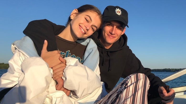 Kaia Gerber posing on a boat with Presley Gerber