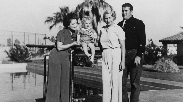 Clara Bow poses with her son and two friends 