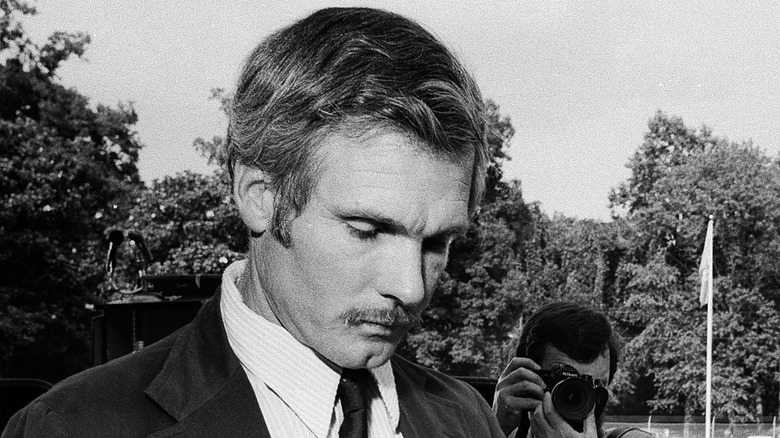 Ted Turner as a young man looking down