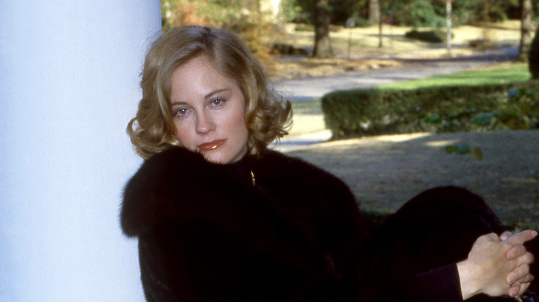 Cybill Shepherd leaning on pillar