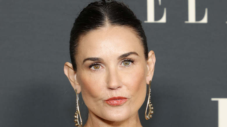 Demi Moore pursing her lips