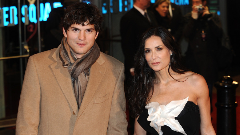 Demi Moore and Ashton Kutcher walking around