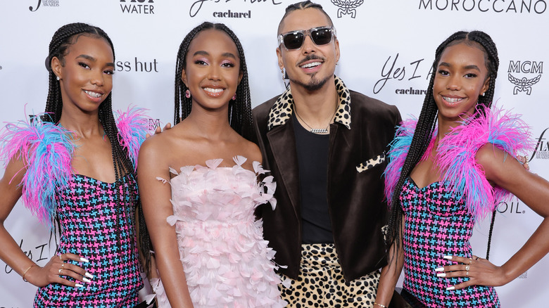 The Combs sisters with their brother Quincy Combs