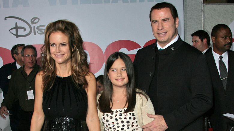 Young Ella Bleu posing with parents Kelly Preston and John Travolta at Old Dogs premiere