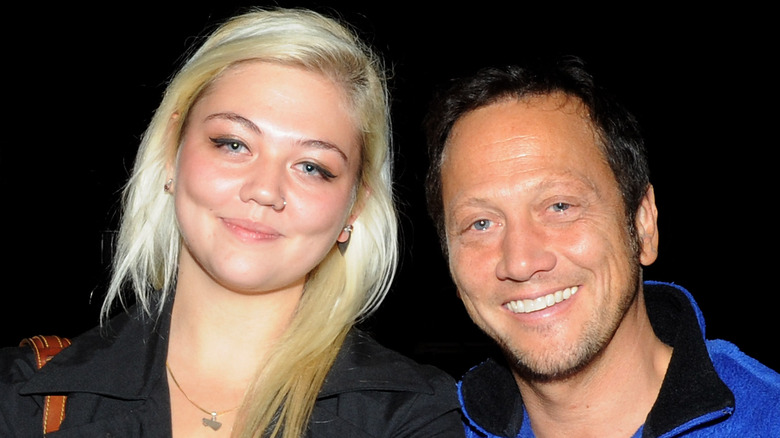 Elle King smiling with Rob Schneider