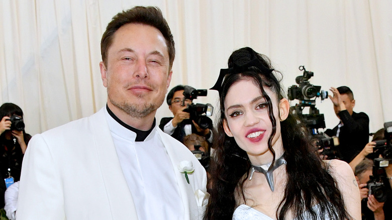 Grimes and Elon Musk on the red carpet at the Met Gala