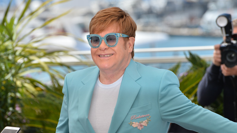  Elton John in blue suit