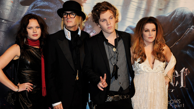 (L-R) Unnamed guest, Michael Lockwood, Ben Keough and Lisa Marie Presley attend the World Premiere of Harry Potter And The Deathly Hallows: Part 1, November, 2010