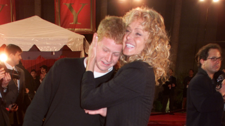 Farrah Fawcett hugging Redmond O'Neal