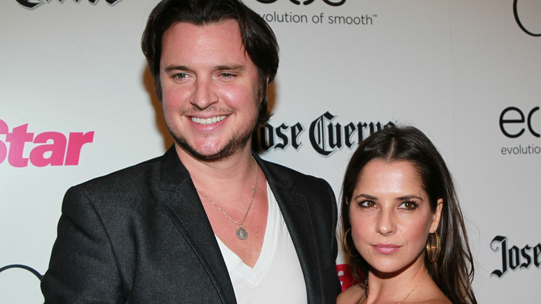 kelly monaco and heath freeman posing together red carpet