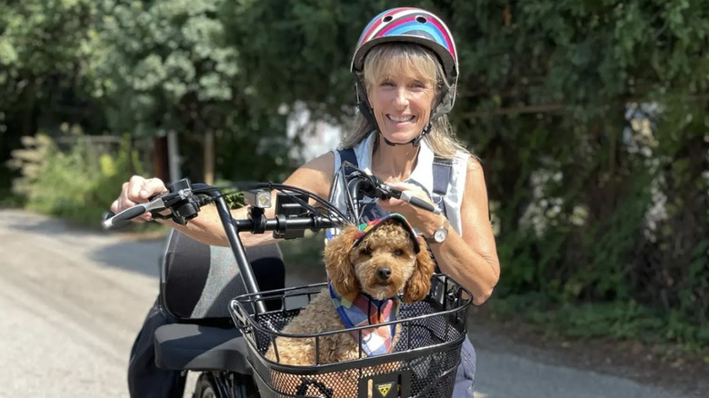 Karen E. Laine with dog and bike