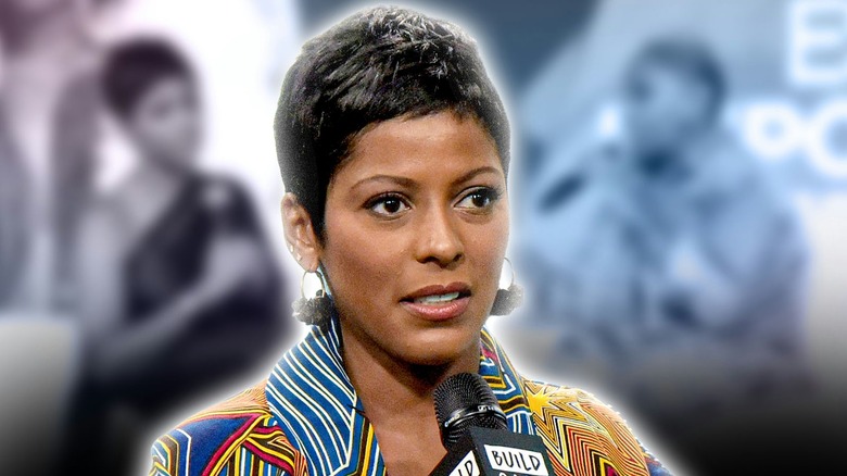 Tamron Hall talking in a microphone