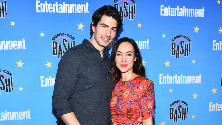 Brandon Routh arm around Courtney Ford