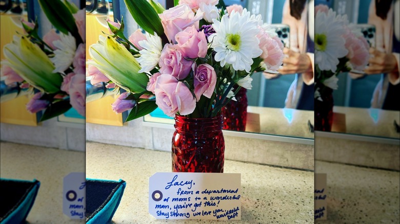 Lacey Chabert receiving flowers