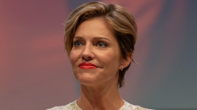 Tricia Helfer wearing red lipstick