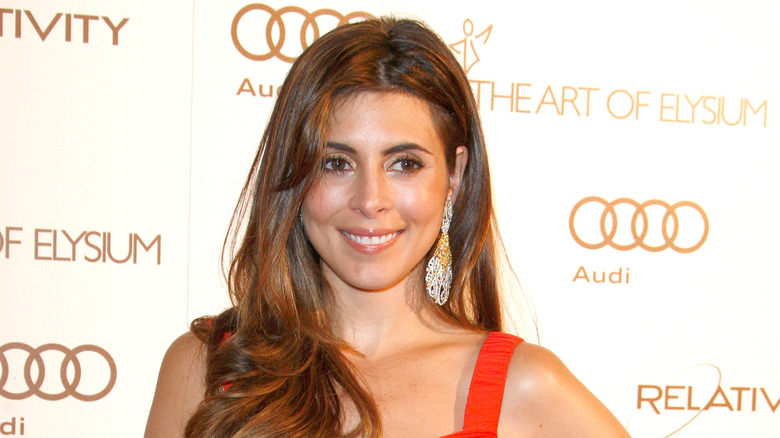 Jamie-Lynn Sigler posing at an event