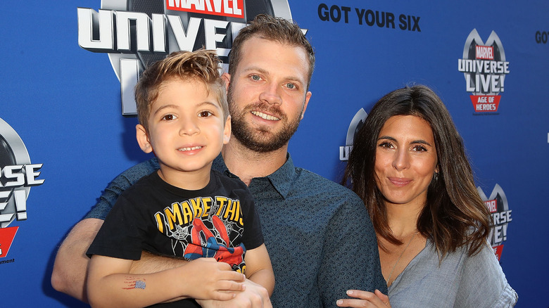 Jamie-Lynn Sigler posing with her son and husband