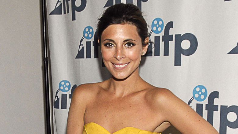 Jamie-Lynn Sigler posing at an event