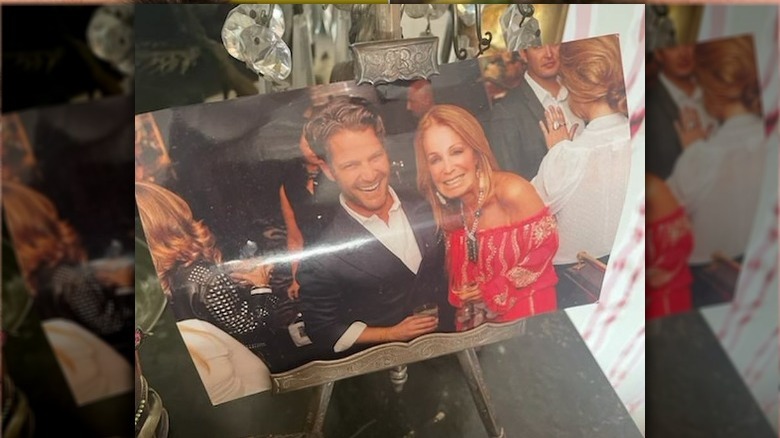 A photograph of Nake Berkus and Barbara Berger smiling