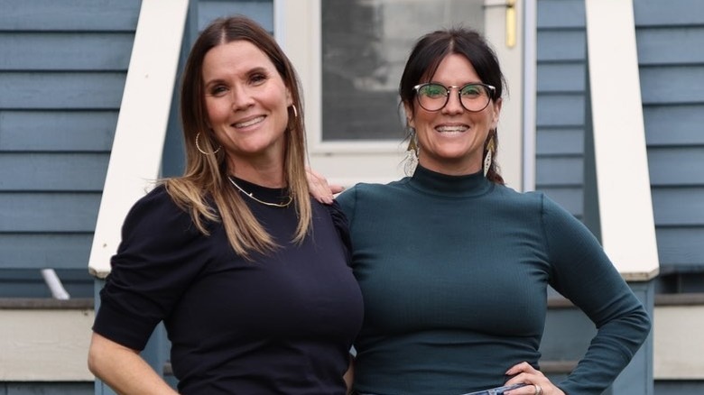 Leslie Davis and Lyndsay Lamb standing with an arm around each other