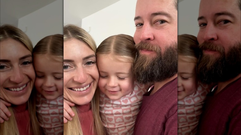 Jasmine Roth in a selfie with her daughter and husband