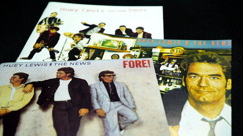 Collage of Huey Lewis album covers