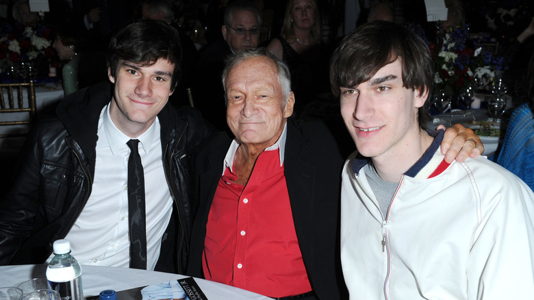 marston hefner with father hugh hefner and brother cooper