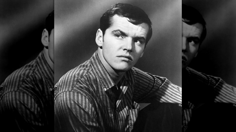 Black and white photo of Jack Nicholson in striped shirt