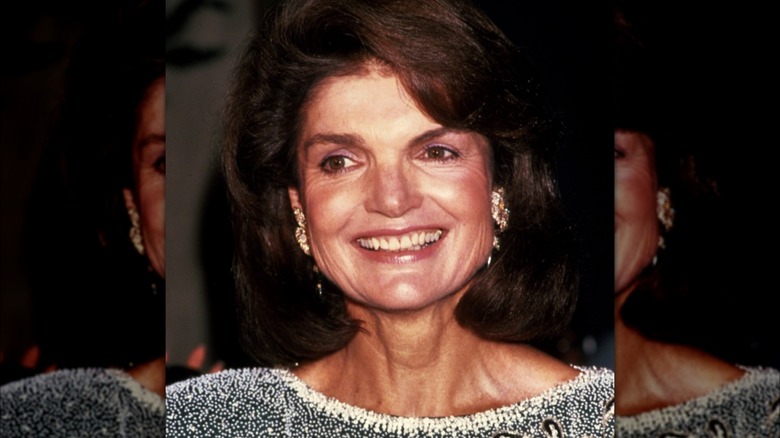 Jackie Kennedy Onassis smiling