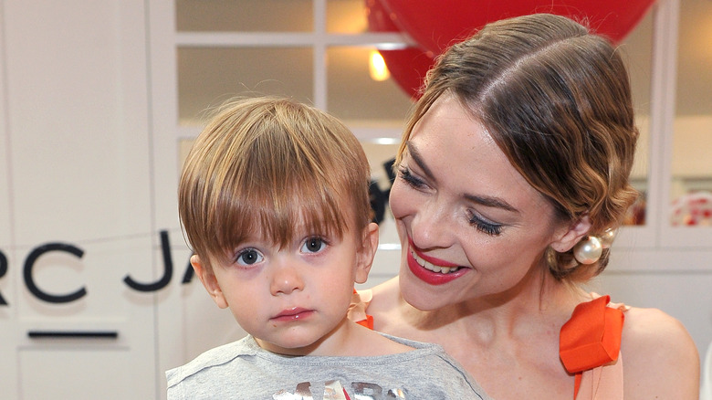 Jaime King holding son Leo Thames 