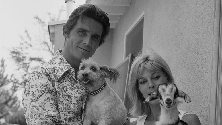 James Brolin and Jane Cameron Agee holding animals