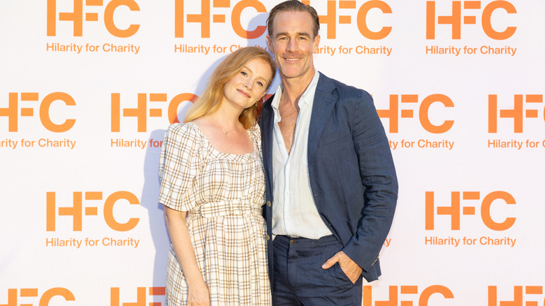 James Van Der Beek smiling with his wife Kimberly Van Der Beek