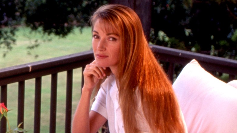 Jane Seymour resting her chin on her hand with penetrating look in her eyes