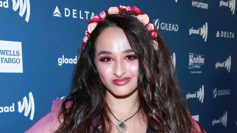 Jazz Jennings wearing flowery hair decorations