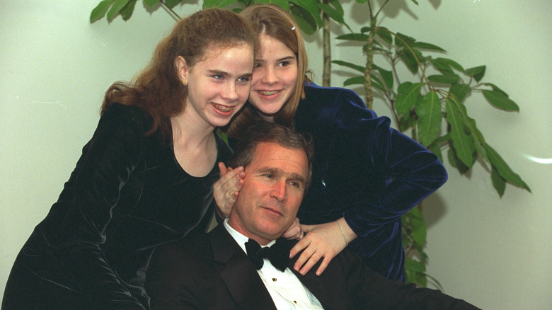 Barbara Bush and Jenna Bush Hager posing with George W. Bush