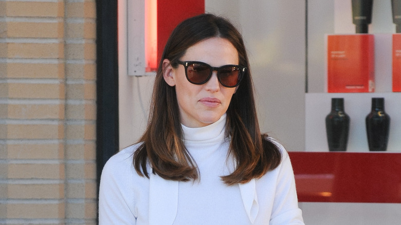 Jennifer Garner in oversized glasses and white jumper