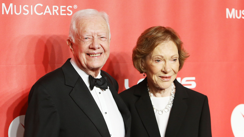 Jimmy Carter and Rosalynn Carter posing red carpet