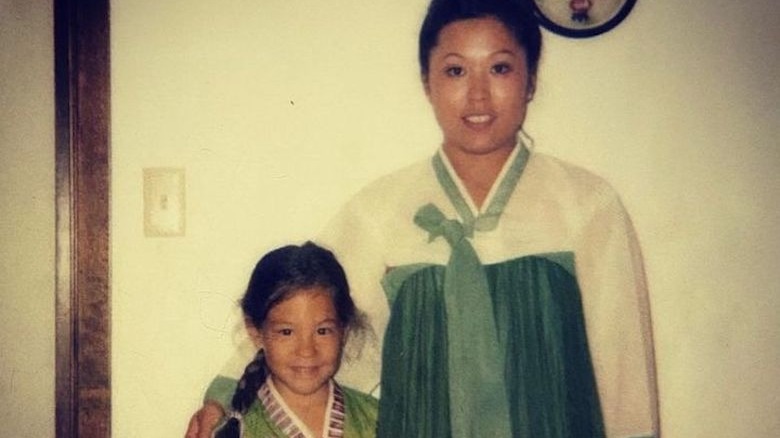 Young Joanna Gaines and her mom, posing