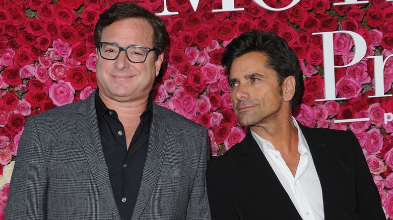 Bob Saget and John Stamos posing