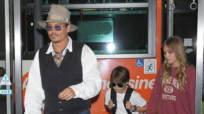 Johnny Depp and his kids outside