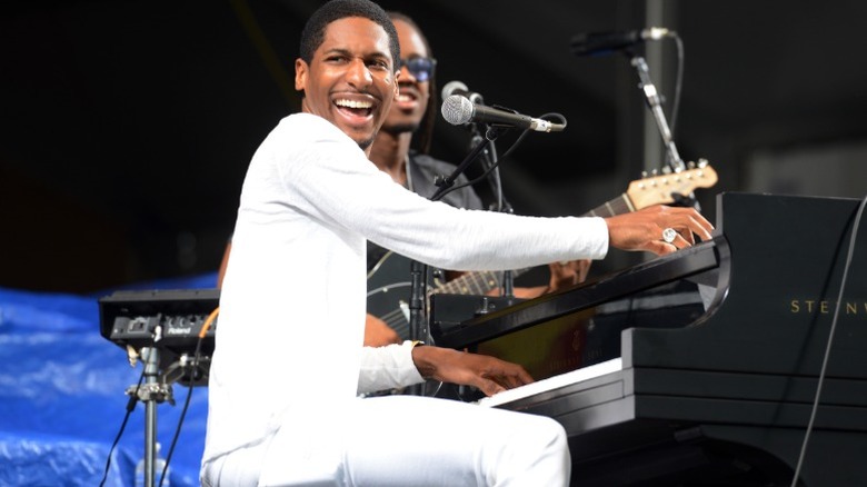 Jon Batiste performs onstage at the 2016 New Orleans Jazz and Heritage Festival