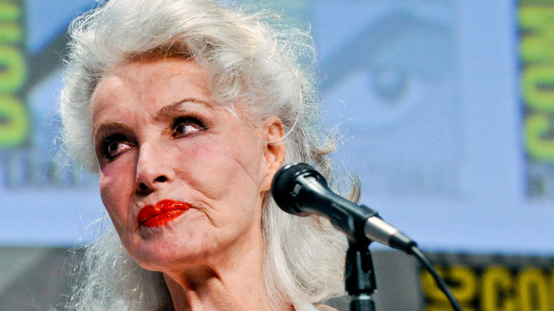 Julie Newmar with microphone