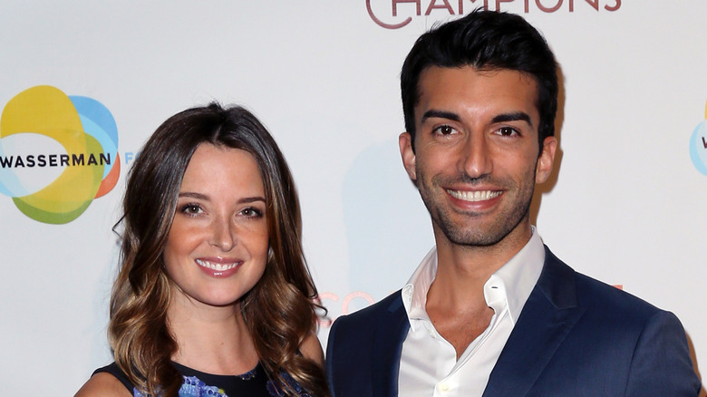 Justin Baldoni stands with his wife Emily Baldoni